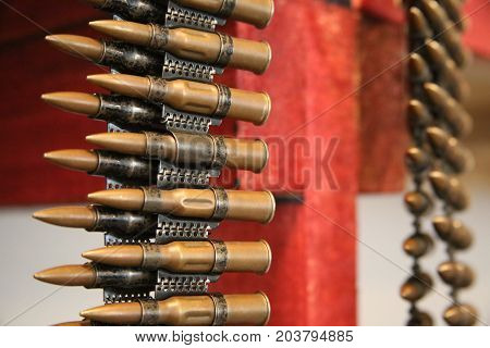 Cartridges in machine-gun belt Close-up view of few items