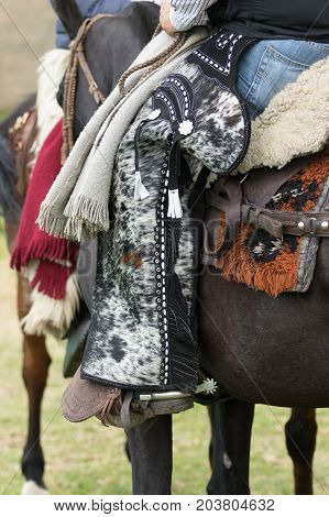 June 3 2017 Machachi Ecuador: cowboy from the Andes called 'chagra' on horseback wearing traditional chaps