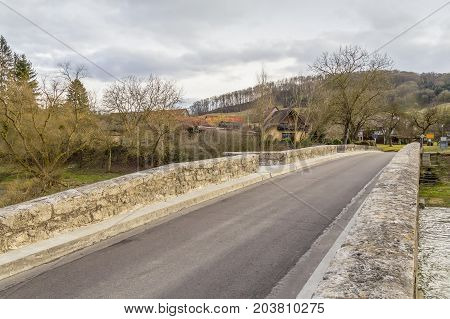 historic stone bridge at a small rural village named Oberregenbach near Langenburg in Hohenlohe a area in Southern Germany