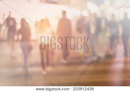pedestrian on zebra in motion blur, Blur abstract people background, unrecognizable silhouettes of people walking on a street
