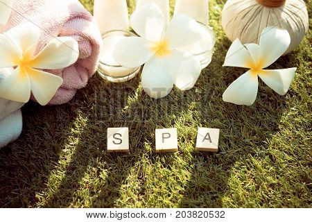 Spa massage compress balls herbal ball on the wooden with treaments spa Thailand select focus