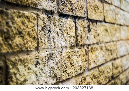 Stone wall , old , dirty showing mortar