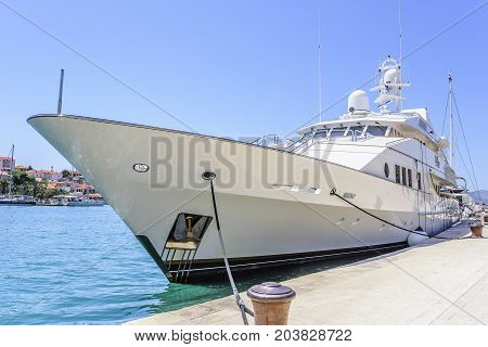 TROGIR, CROATIA - JULY 12, 2017: Huge luxury yacht parked in the water of Trogir Croatia