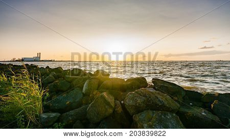 Sunset above a binary lake in the Netherlands with views over the water and the setting sun