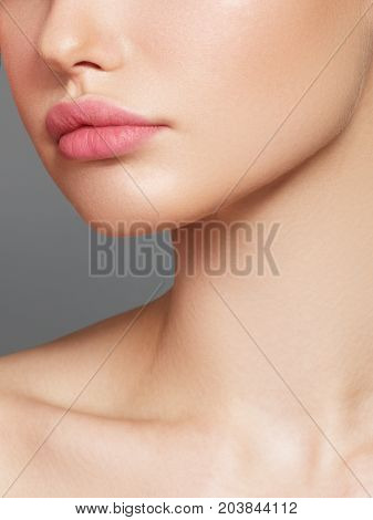 Sexy Plump Full Lips. Close-up Face Detail. Perfect Natural Lip Makeup. Close Up Photo With Beautifu