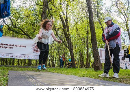 The Athlete Does Exercises During A Public Open Competition For Doing Standards Trp In Kirov City In