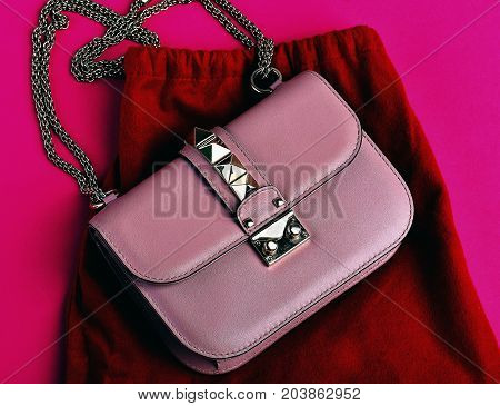 Small Womans Leather Pink Bag With Red Skirt