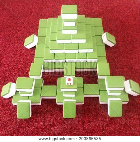 Red mahjong mat, green mahjong styling close-up .