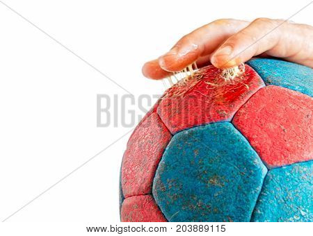 Close up of excess use of handball resin on player's fingers enhanced handball grip isolated on white