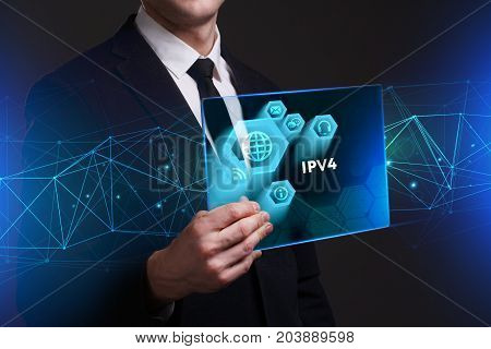 Business, Technology, Internet And Network Concept. Young Businessman Working On A Virtual Screen Of