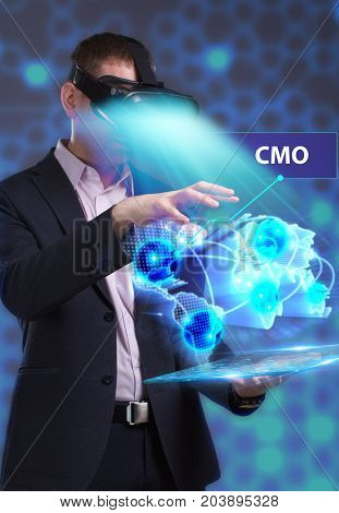 Business, Technology, Internet And Network Concept. Young Businessman Working In Virtual Reality Gla