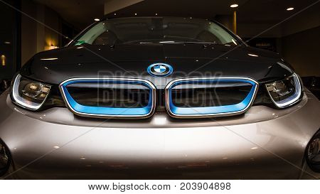 BERLIN - NOVEMBER 28 2014: Showroom. The BMW i3 previously Mega City Vehicle (MCV) is a five-door urban electric car developed by the German manufacturer BMW.