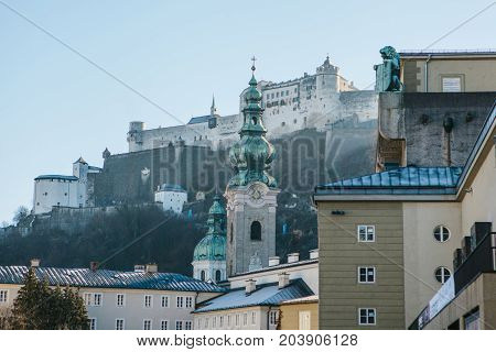 Nonnberg abbey in Salzburg in Austria. One of the attractions of the city and a favorite place for visiting tourists. In the background is the fortress of Hohensalzburg.