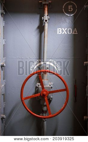 Heavy steel door in the bomb shelter