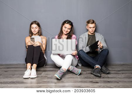 Gadgets And Technology, People. Diverse Friends In Coworking Using Smart Devices, Students Preparing