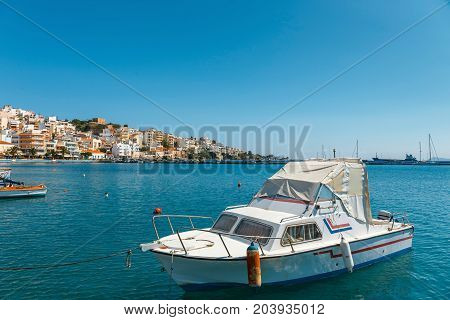 Sitia, Crete, Greece - June 11, 2017: Seaport Of Sitia Town With Moored Traditional Greek Fishing Bo