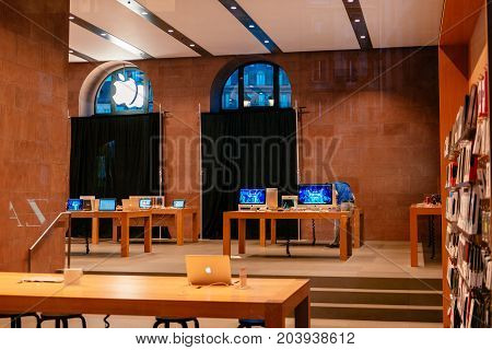 STRASBOURG FRANCE - SEP 18 2014: Street view Apple Store with secrecy covered windows preparing to re-design re-furnish the interior of the computer store for he upcoming launch of the new products latest iPhone Apple Watch iMAc and MAcbook pro computers.
