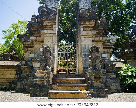 BALI, INDONESIA - MARCH 11, 2017: Entrance of an Indu temple in Ubud, in the island of Bali, located in Indonesia.