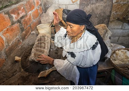 April 21 2017 Iluman Ecuador: wet wool is beaten by hand to soften the material in the hat making process