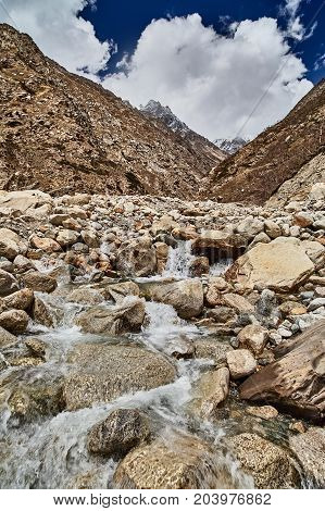 Mountain creek in Himalaya mountains. Close up. Gaumukh glacier Gangotri Uttarakhand India.