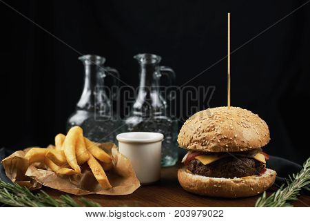 Delicious burger with French fries from the chef.