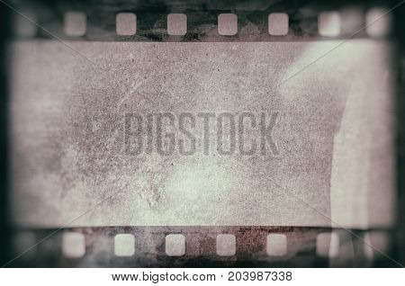 Blank grained and scratched film strip texture background