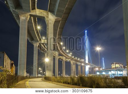 Elevated Highway And Bridge In Hong Kong City At Night