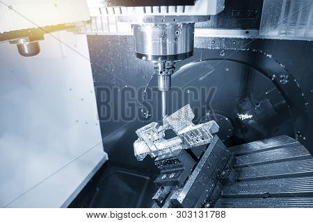 The 5-axis Machining Centre Cutting The Aluminium  Aerospace Part With Solid Ball  Endmill Tool. The