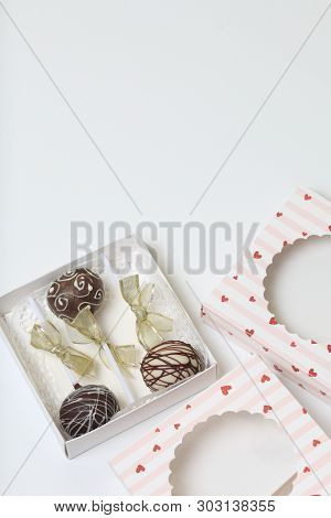 Cake Pops Decorated With A Bow Of Braid, Packed In A Gift Box.