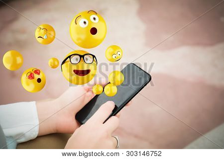 Woman Using Smartphone Sending Emojis.