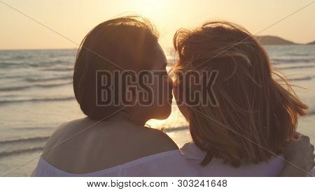 Young Asian Lesbian Couple Kissing Near Beach. Beautiful Women Lgbt Couple Happy Relax Enjoy Love An