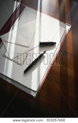 Table With Stationery Prepared For Business Meeting In Conference Hall
