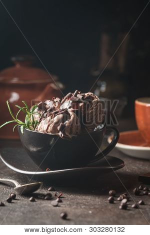 Chocolate Coffee Ice Cream Balls In A Bowl Over Dark Background
