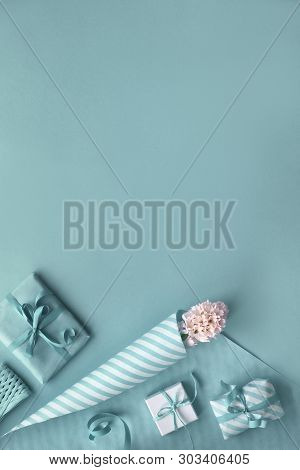 Blue Background With Pink Hyacinth, Wrapping Paper And Wrapped Gift Boxes, Copy-space