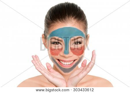 Fun beauty product multimask woman applying different masks on skin. Facial treatment trend multimasking. Face mask lifestyle.