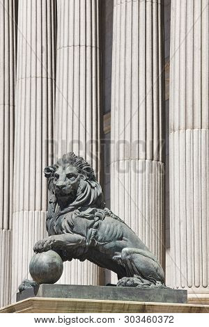 Parliament Facade Columns And Lion In Madrid, Spain. Congreso Diputados