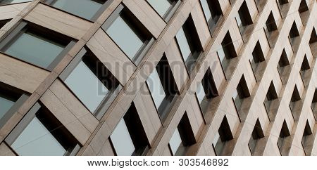 Modern Office Building With A Rhythmic Arrangement Of Windows