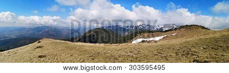 Panoramic Mountains Landscape In Early Spring - Snow In The Mountains