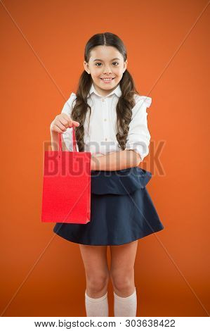 Girl Holding Shopping Bag. Prepare For School Season Buy Supplies Stationery Clothes In Advance. Sch