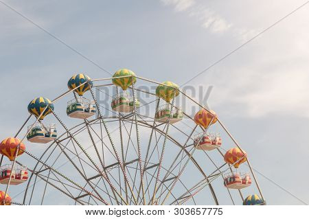 Close Up Of Colorful Ferries Wheel, Sky