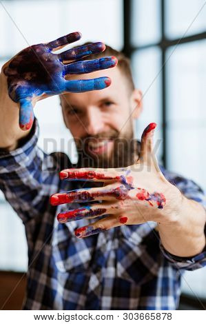 Artist Delight Imagination Inspiration. Smiling Painter Looking At Camera. Hands Frame With Red Blue