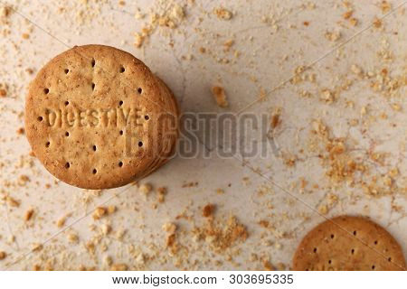 Stack Of Sweetmeal Digestive Biscuits Closeup Of A Pile Of Biscuits On A Texture Background