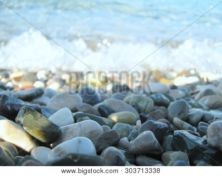 Mediterranean Coast, Multicolored Stones Near And Sea