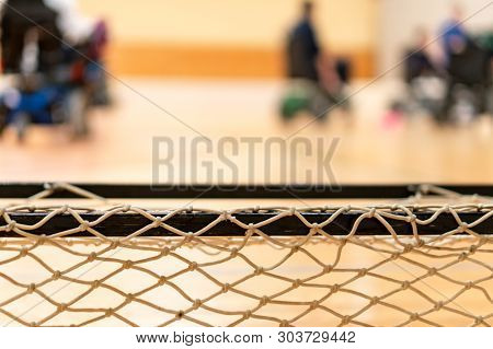 Disabled People In Blur On An Electric Wheelchair Playing Sports, Powerchair Hockey. Wheelchair And 
