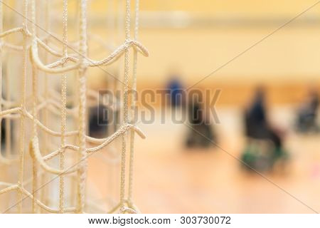 Disabled People In Blur On A Wheelchair Playing Sports, Hockey - Wheelchair And Amputee Sports Power
