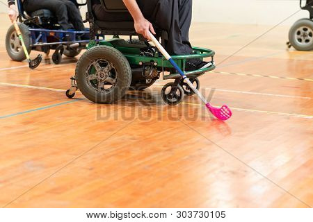 Photo Of Disabled Man On A Wheelchair Playing Sports, Hockey - Wheelchair Amputee Sports Powerchair 