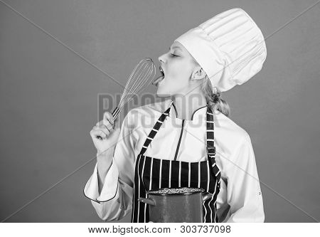 Whipping Like Pro. Girl In Apron Whipping Eggs Or Cream. Start Slowly Whisking Whipping Or Beating C