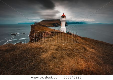 famous lighthouse on the island of Mykines, Faroe.
