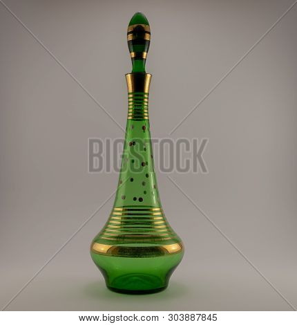 Vintage Toscany Green Glass And Gold Stripes On A White Back Ground