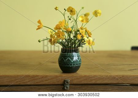 Wild Yellow Flowers, Meadow Buttercup, In Small Vase. Bouquet Of Fresh Wild Flowers, Ranunculus Acri